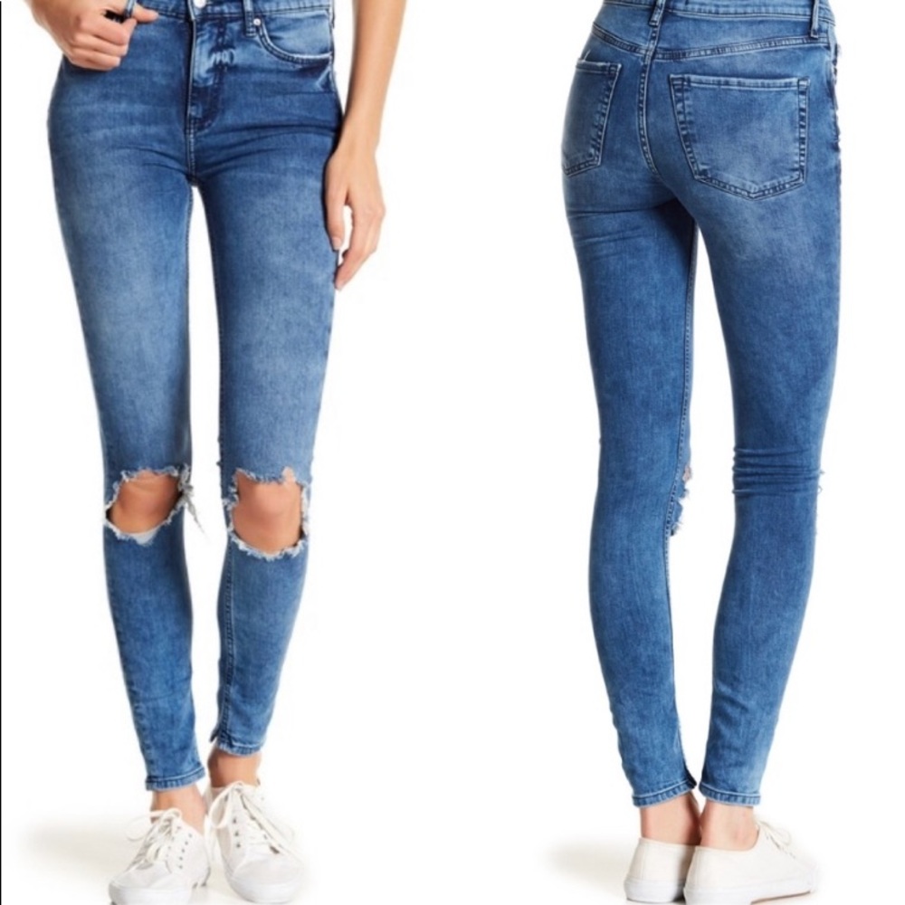 Free People Busted knee skinny jeans.